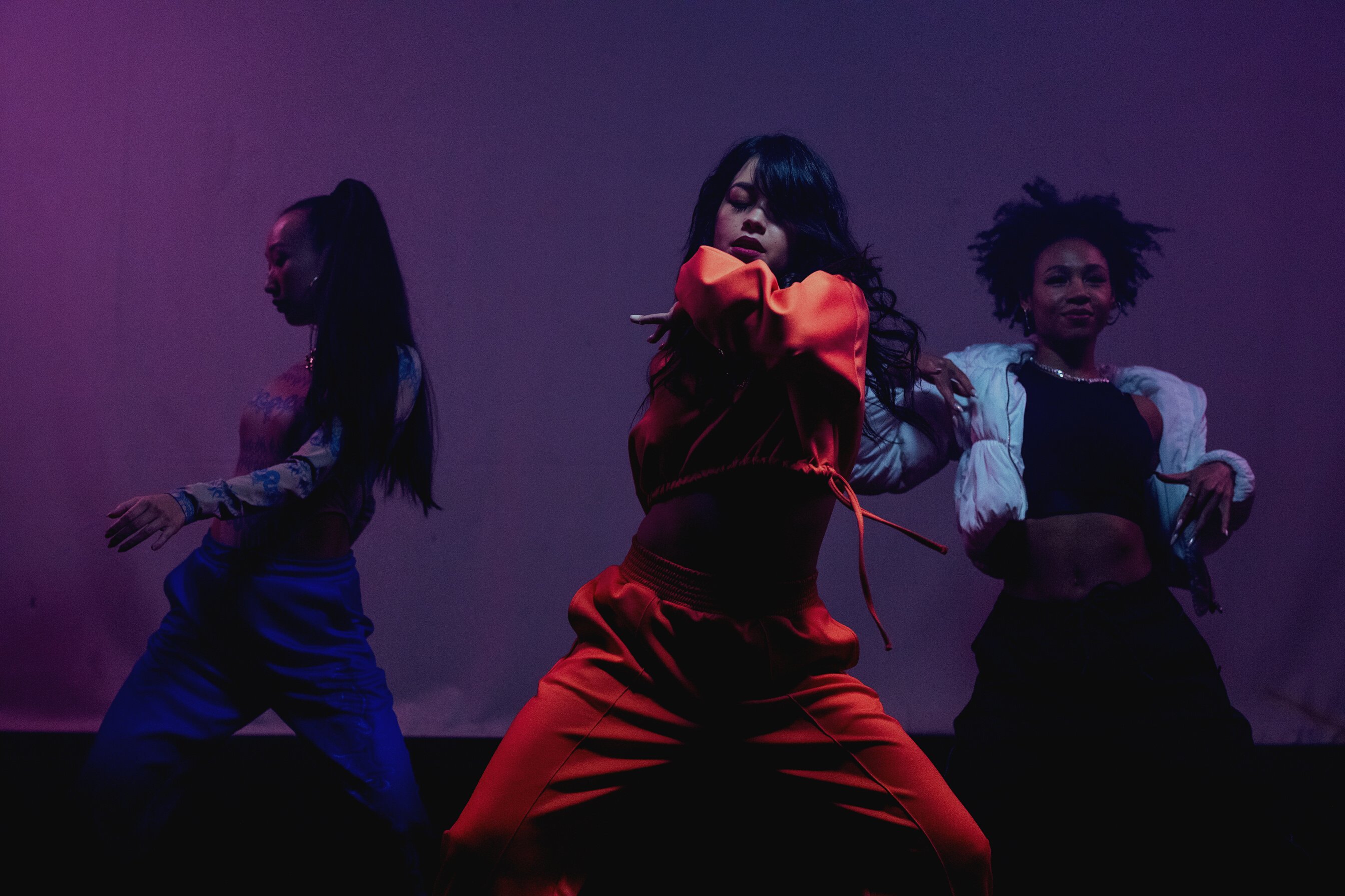 Photo of Three Women Dancing